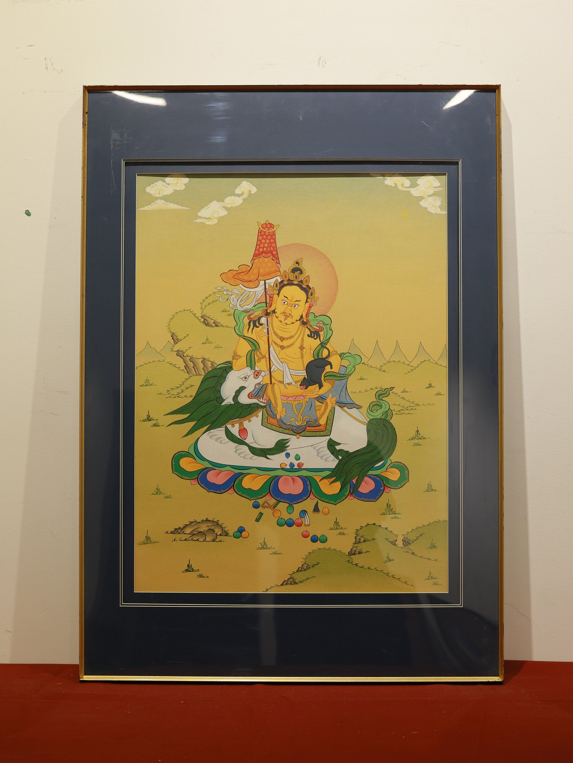 Vibrant Tibetan Buddhist Thangka featuring the Treasure King adorned in elaborate robes, symbolizing abundance and fortune.
