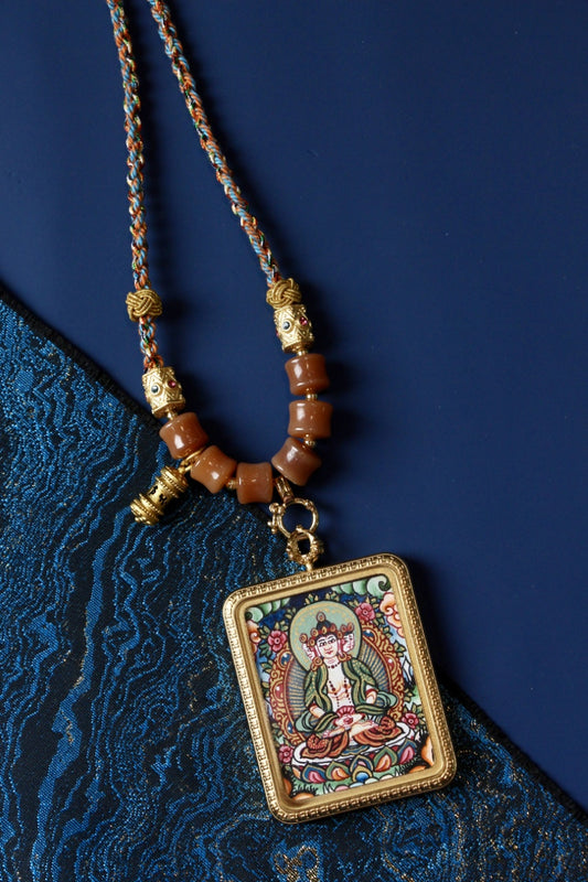 Vairocana Buddha Thangka Pendant in Tibetan Buddhist culture, symbolizing the ultimate enlightenment and cosmic truth.