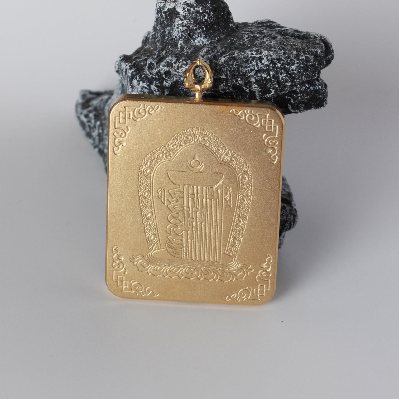 The Nepal Dragon Fifth Lord Thangka pendant displayed as a sacred amulet for wealth and good fortune, embodying Tibetan Buddhist tradition.
