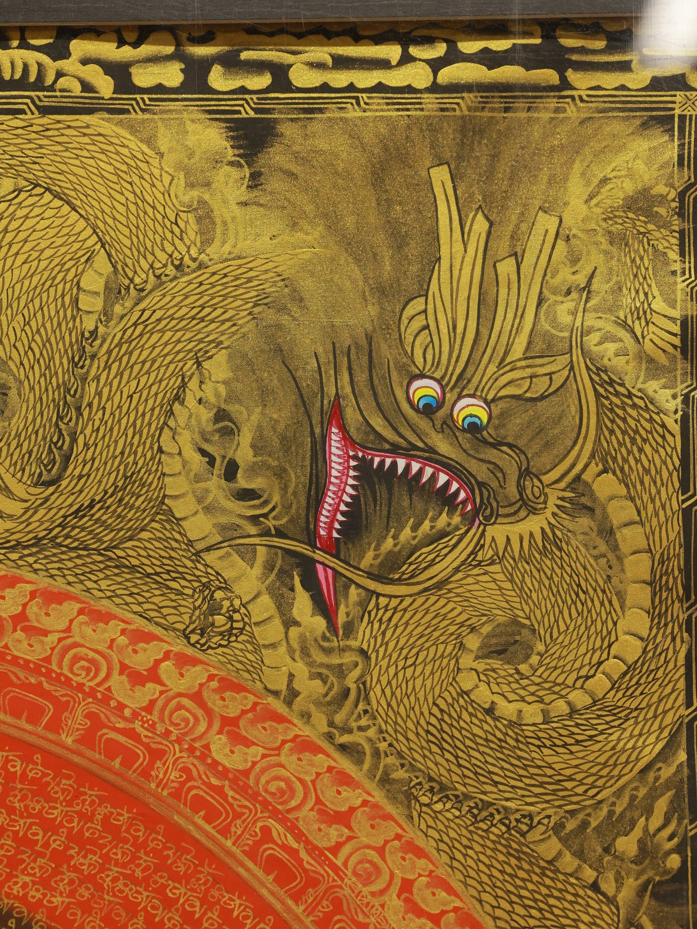 Alt text: “Dragon Mandala Thangka representing compassion and peace in Tibetan Buddhist culture.”