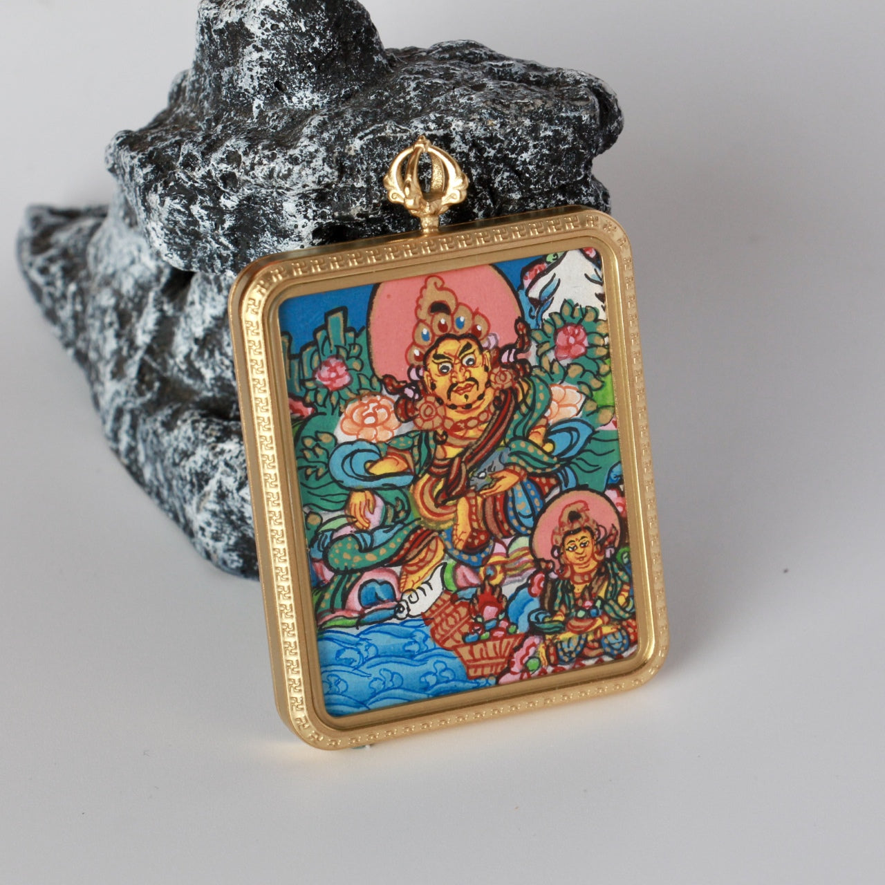  Hand-painted Nepal Dual Yellow Jambhala Thangka pendant featuring Yellow Jambhala with Vasudhara, encased in titanium steel, representing wealth and abundance in Tibetan Buddhist tradition.
