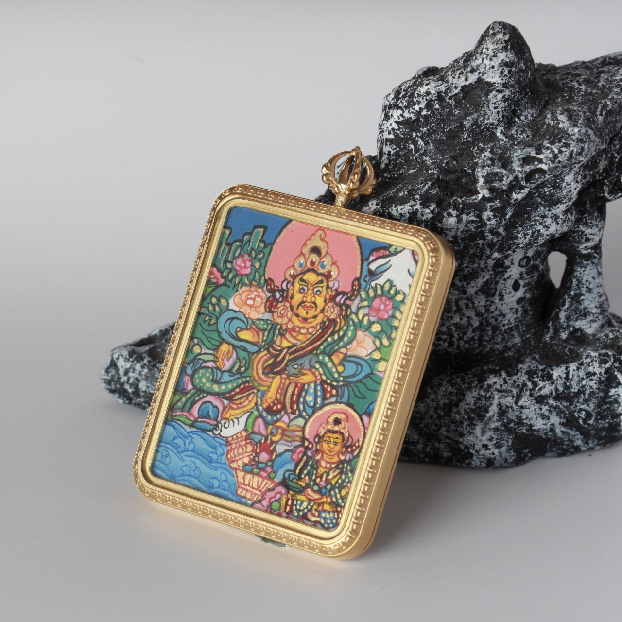  Close-up detail of the Nepal Dual Yellow Jambhala Thangka painting showing intricate natural mineral pigment work, showcasing the masterful artistry of Nepali lineage painters.
