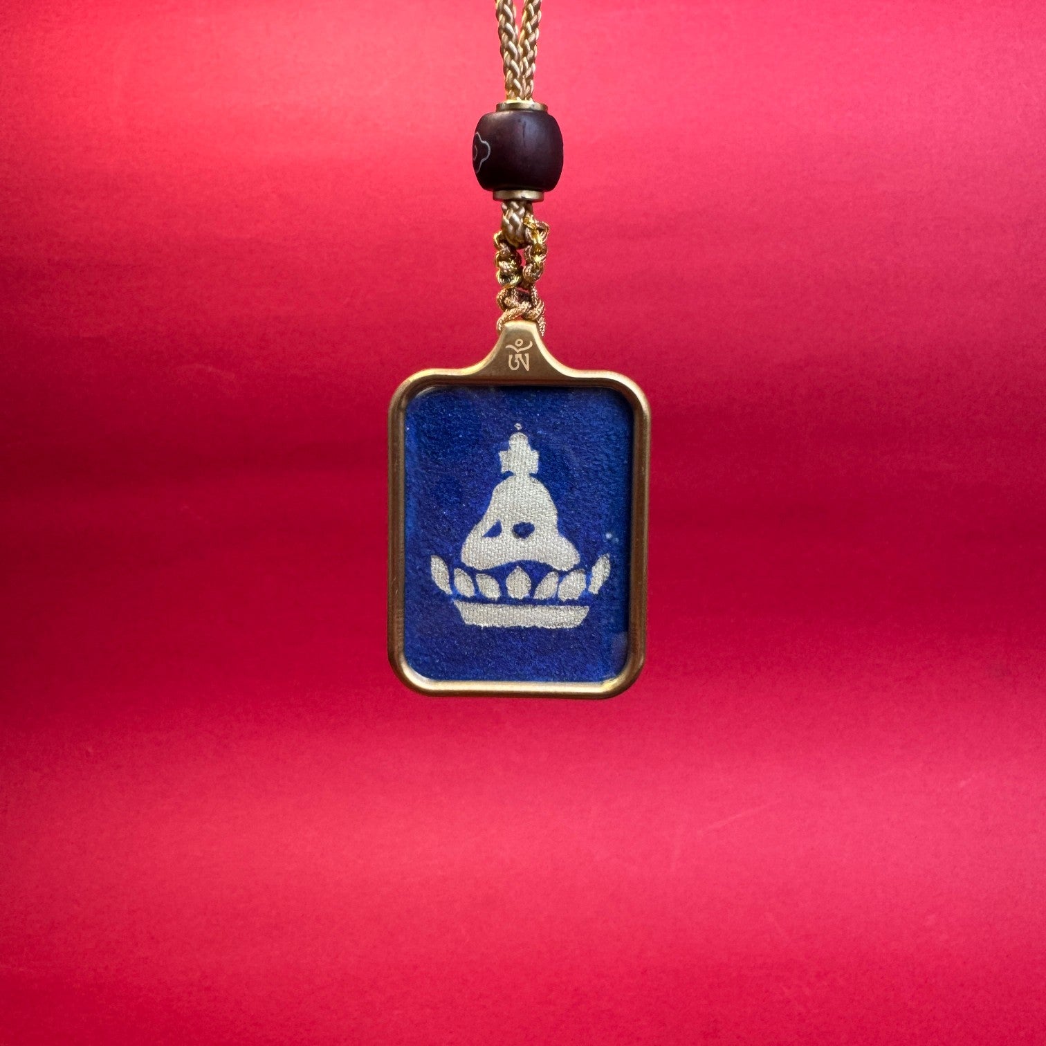  Detailed view of the steel casing for the Formless Buddha Thangka pendant, symbolising acceptance and tradition in Buddhist practice.
