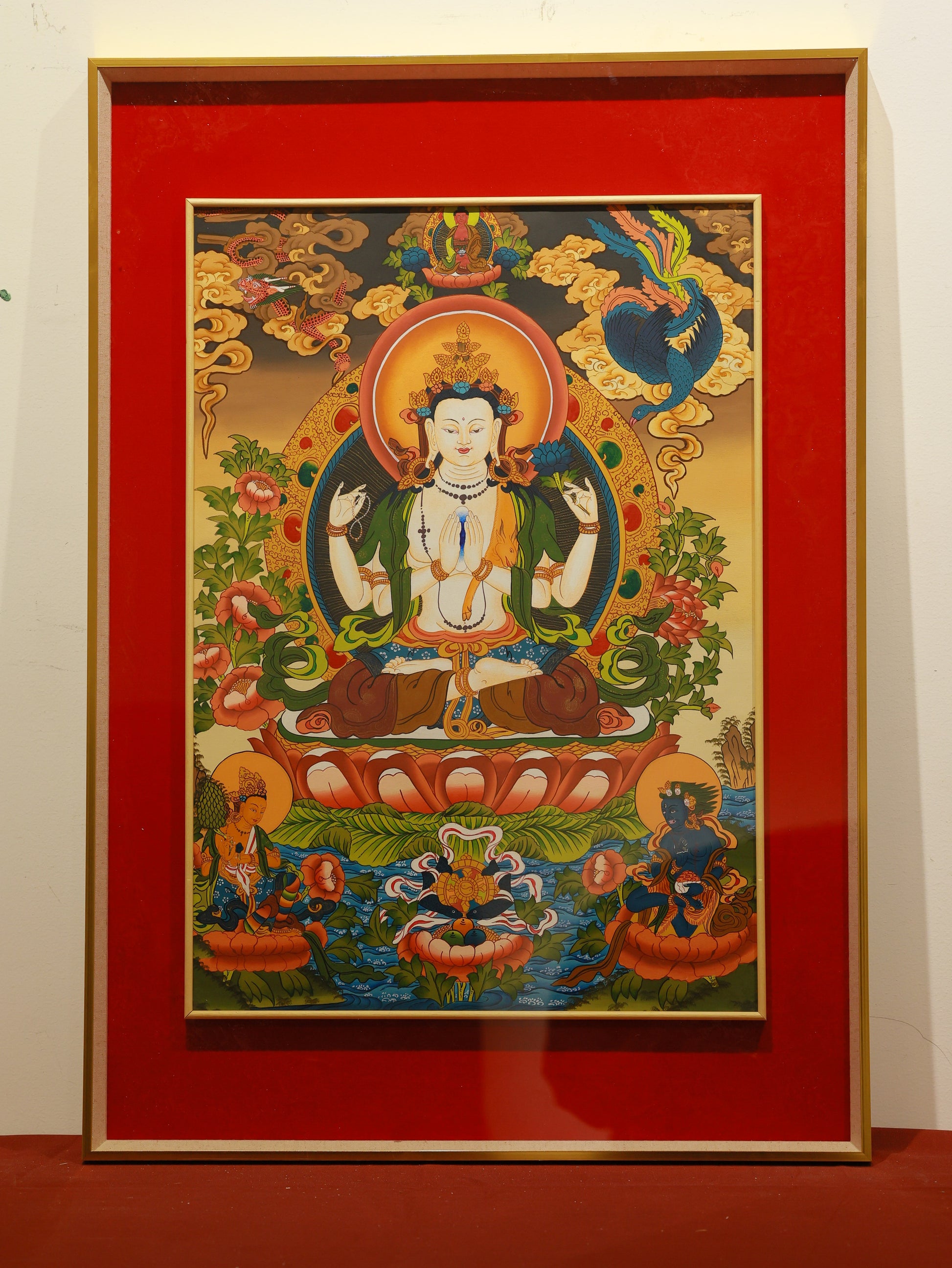 Color thangka of Four-Armed Chenrezig representing infinite compassion and mercy