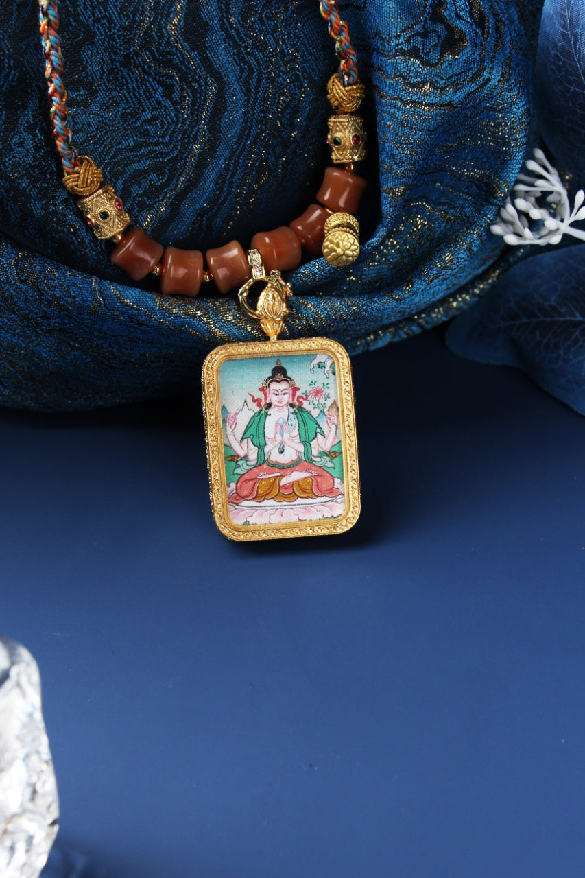  Hand-painted Nepal Premium Green Tara Thangka pendant featuring the Goddess of Compassion and Swift Action, encased in titanium steel, representing compassion in Tibetan Buddhist tradition.

