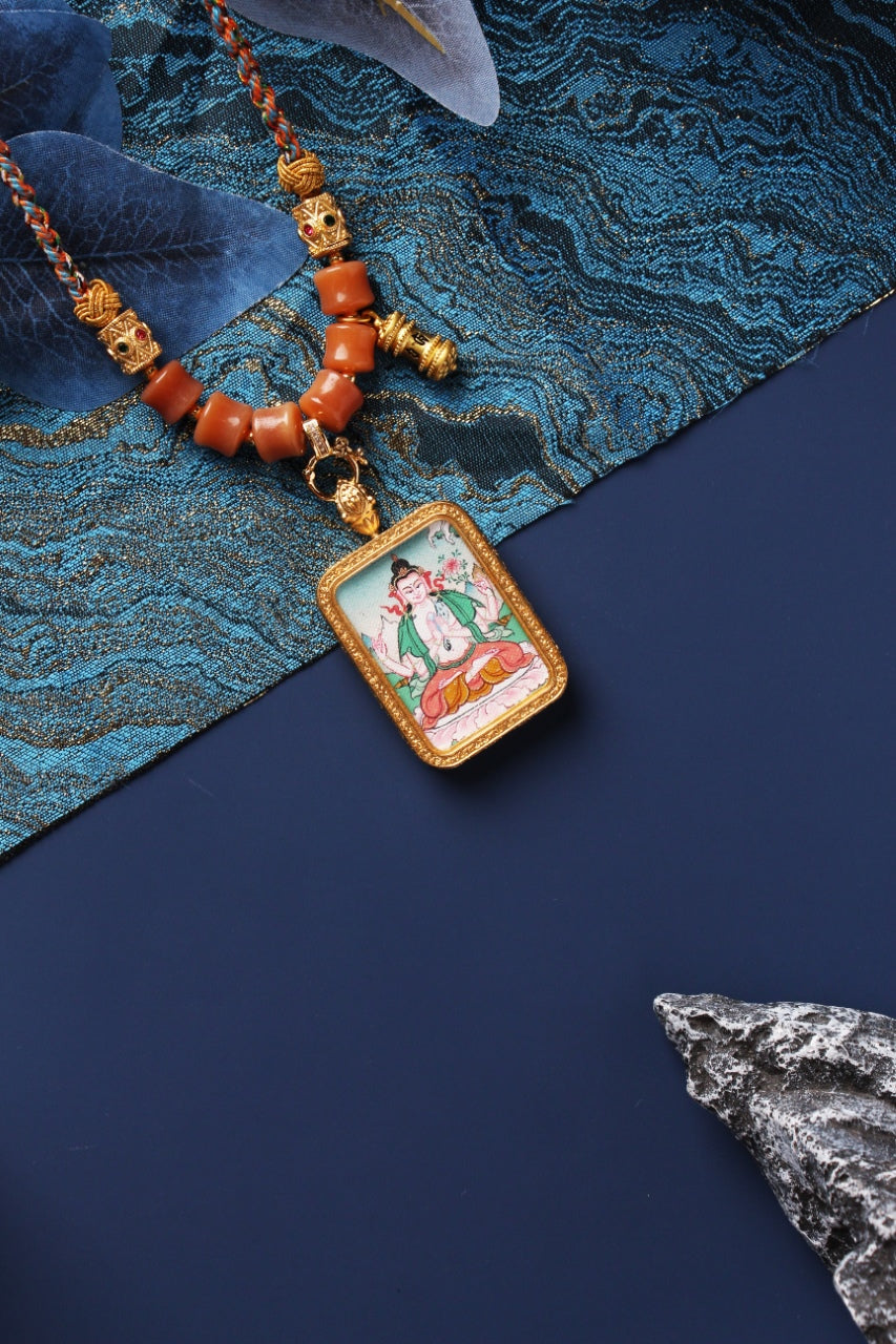  Close-up detail of the Nepal Premium Green Tara Thangka painting showing intricate natural mineral pigment work, showcasing the masterful artistry of Nepali lineage painters.
