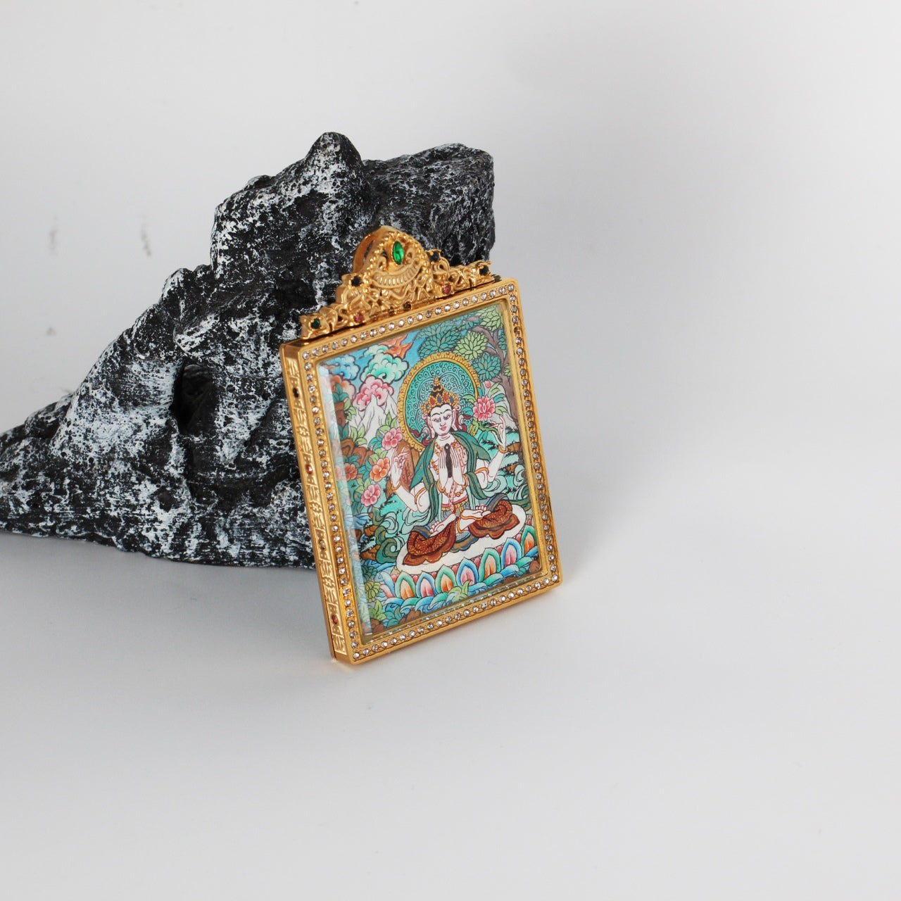 Close-up detail of the Nepal Premium Four-Armed Avalokiteshvara Thangka painting showing intricate natural mineral pigment work, showcasing the masterful artistry of Nepali lineage painters.
