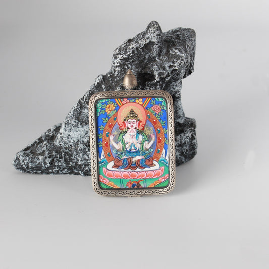 Close-up detail of the Rebgong Four-Armed Avalokiteshvara Thangka painting showing intricate natural mineral pigment work, showcasing the masterful artistry of Rebgong lineage painters.
