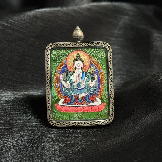  Close-up detail of the Rekong Cuiying Four-Armed Avalokiteshvara Thangka painting showing natural mineral pigments, showcasing the masterful artistry of Rekong lama painters.
