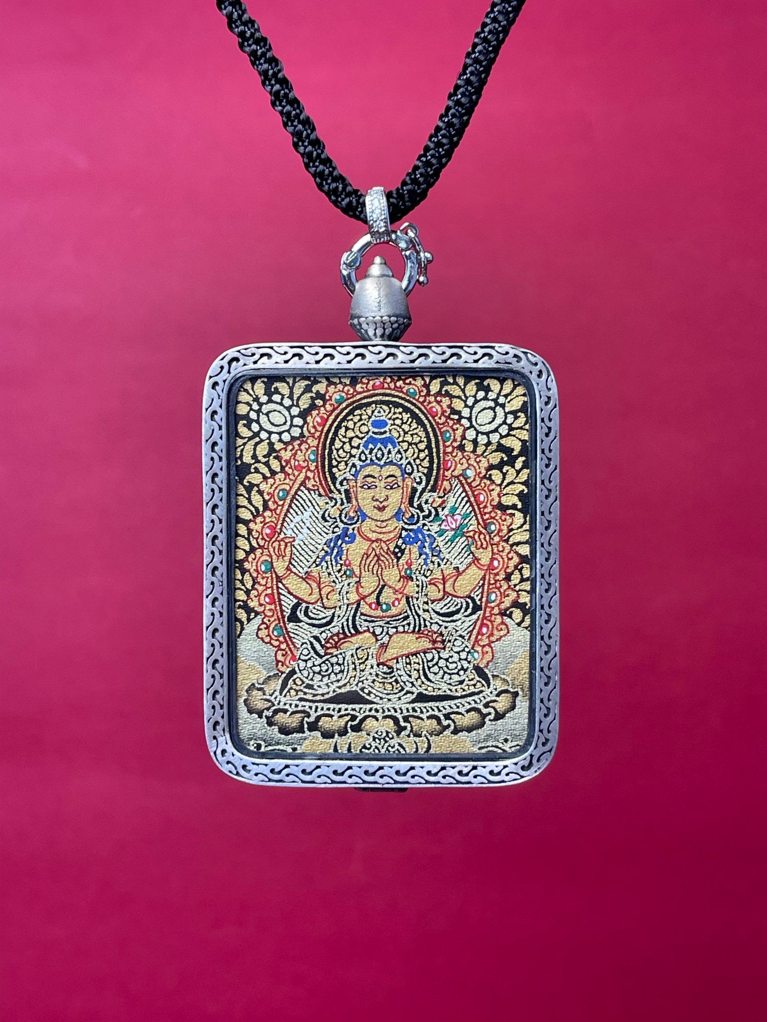  Close-up detail of the Rekong Black Gold Four-Armed Avalokiteshvara Thangka showing mineral pigments and layered pure gold, supports testing.
