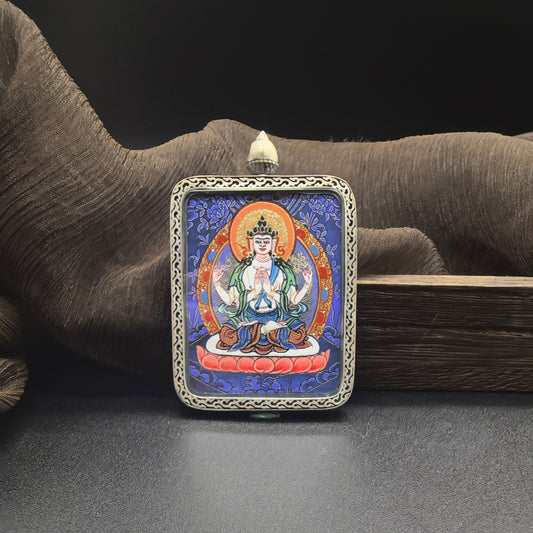  Close-up detail of the Rekong Blue Thangka Four-Armed Avalokiteshvara painting showing natural mineral pigments, showcasing the masterful artistry of Rekong lama painters.

