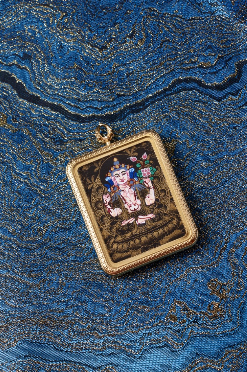 Four-Armed Avalokiteshvara thangka amulet used in Tibetan Buddhism for compassion, protection, and inner peace.