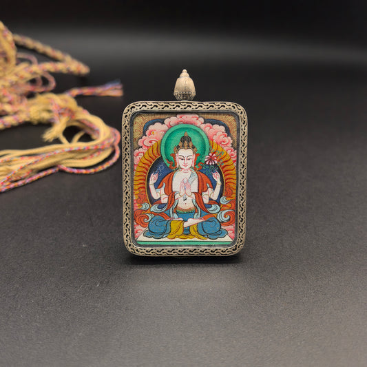 Close-up detail of the Tibet Red Cloud Four-Armed Avalokiteshvara Thangka painting showing natural mineral pigments, showcasing the masterful artistry of the hand-painted tradition.
