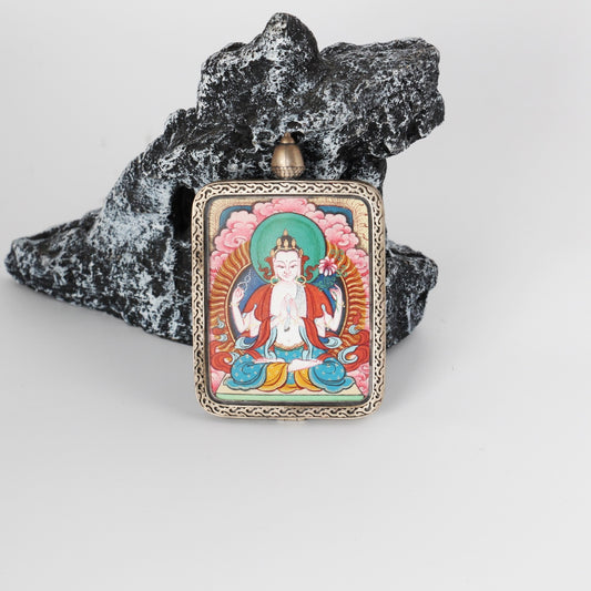  Close-up detail of the Tibet Red Cloud Four-Armed Avalokiteshvara Thangka painting showing intricate natural mineral pigment work, showcasing the masterful artistry of Tibetan lineage painters.
