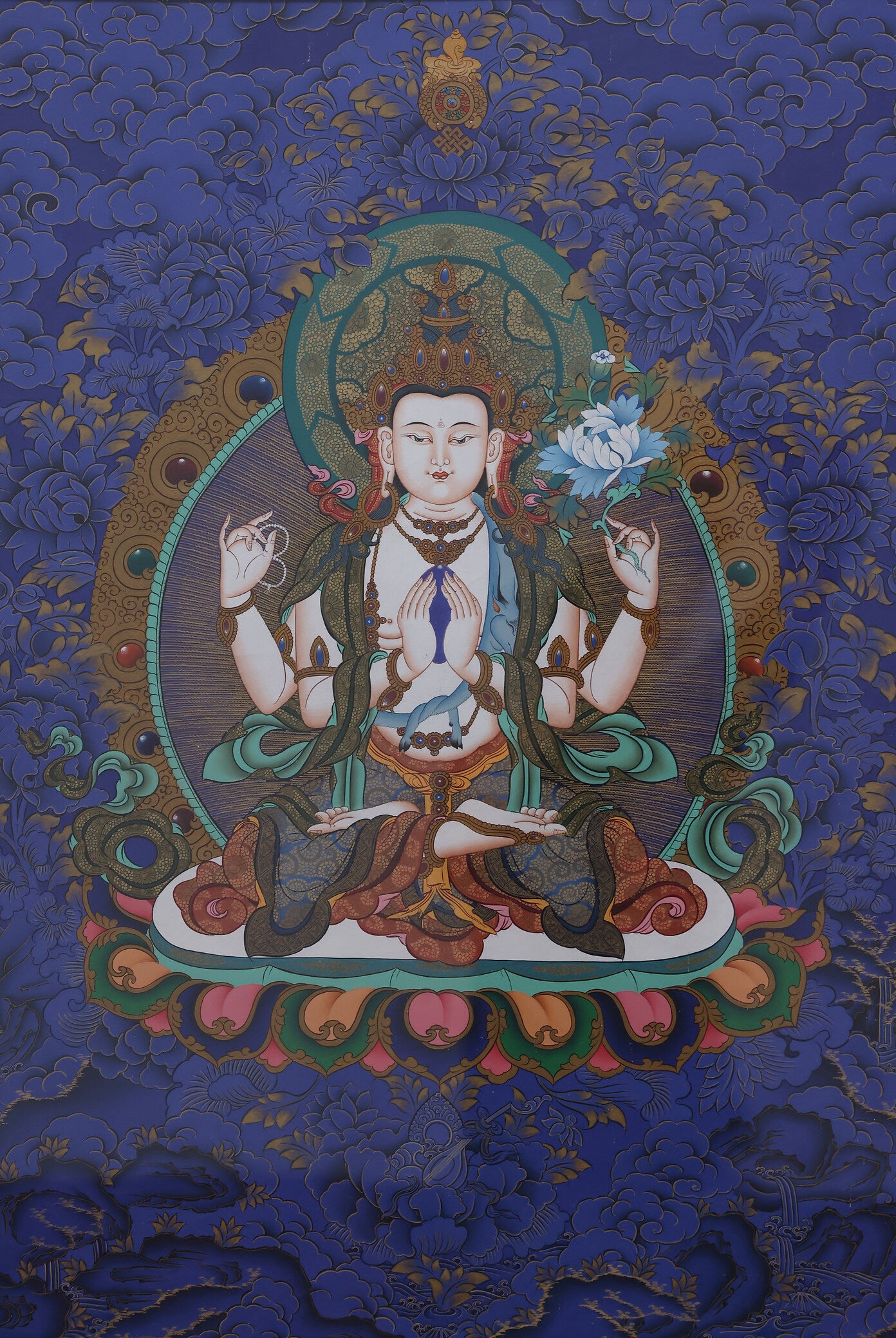 Mandala painting featuring Four-Armed Avalokiteshvara, traditional Tibetan Buddhist Thangka artwork.