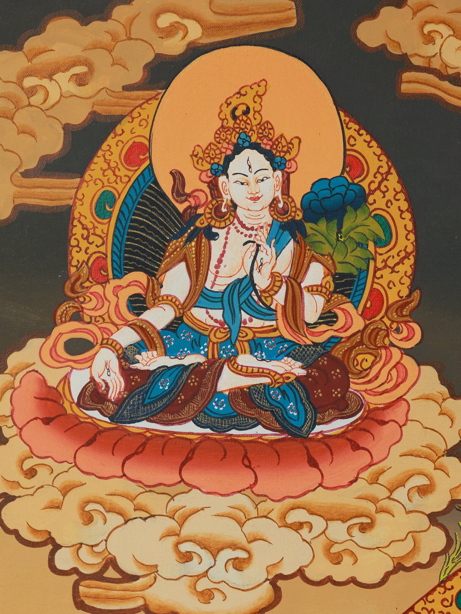 Tibetan Buddhist wealth mandala thangka featuring Yellow Jambhala as the guardian of prosperity