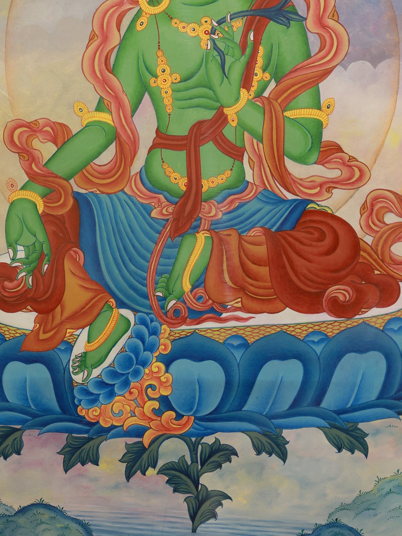 Hand-painted Green Tara thangka in vivid colors created in the traditional Tibetan Buddhist style