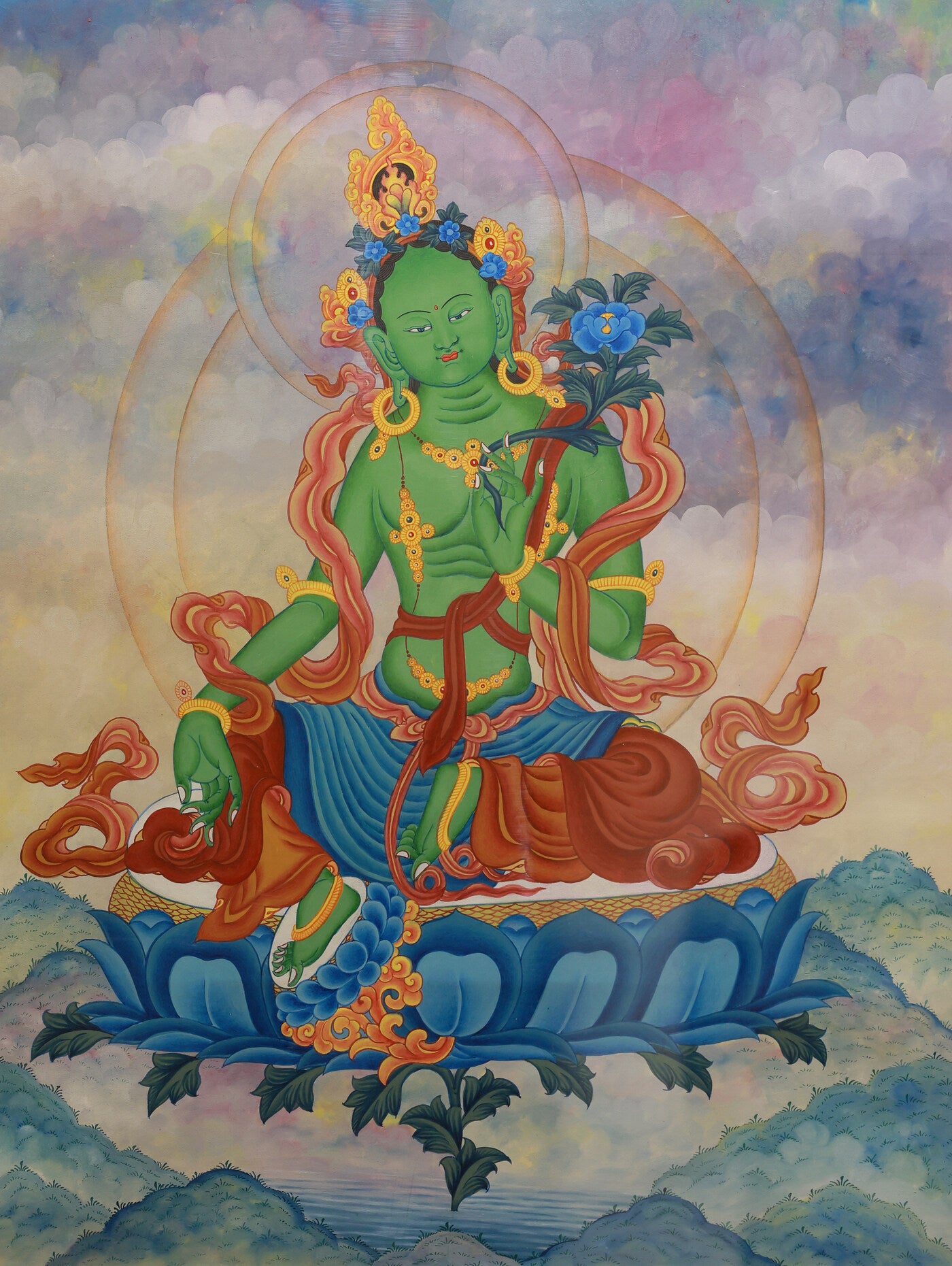 Colorful Green Tara thangka showing the Tibetan Buddhist goddess of compassion and protective blessings