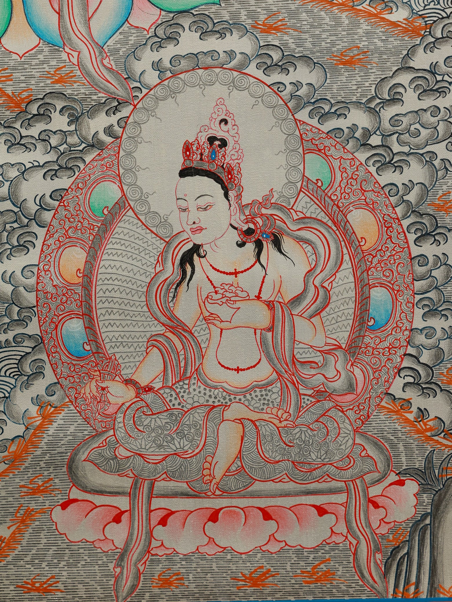 Spiritual awakening with Green Tara depicted in this traditional Tibetan Thangka.
