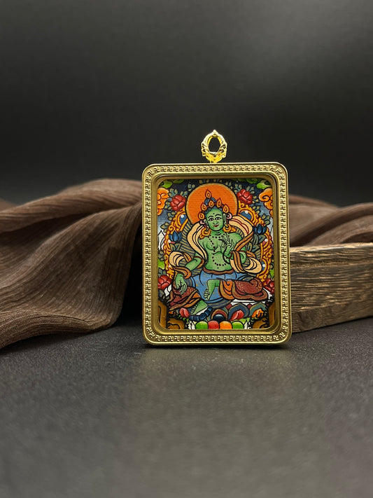  Detailed view of the titanium casing for the Green Tara Thangka pendant, symbolising compassion and tradition in Buddhist practice.
