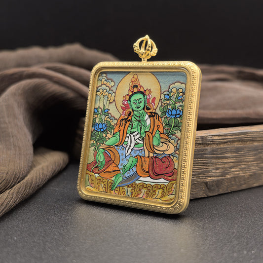  Hand-painted Nepal Green Tara (绿度母) Thangka pendant 4x5cm with titanium casing featuring the goddess of compassionate action, representing the dispelling of calamity and compassion in Buddhist tradition.
