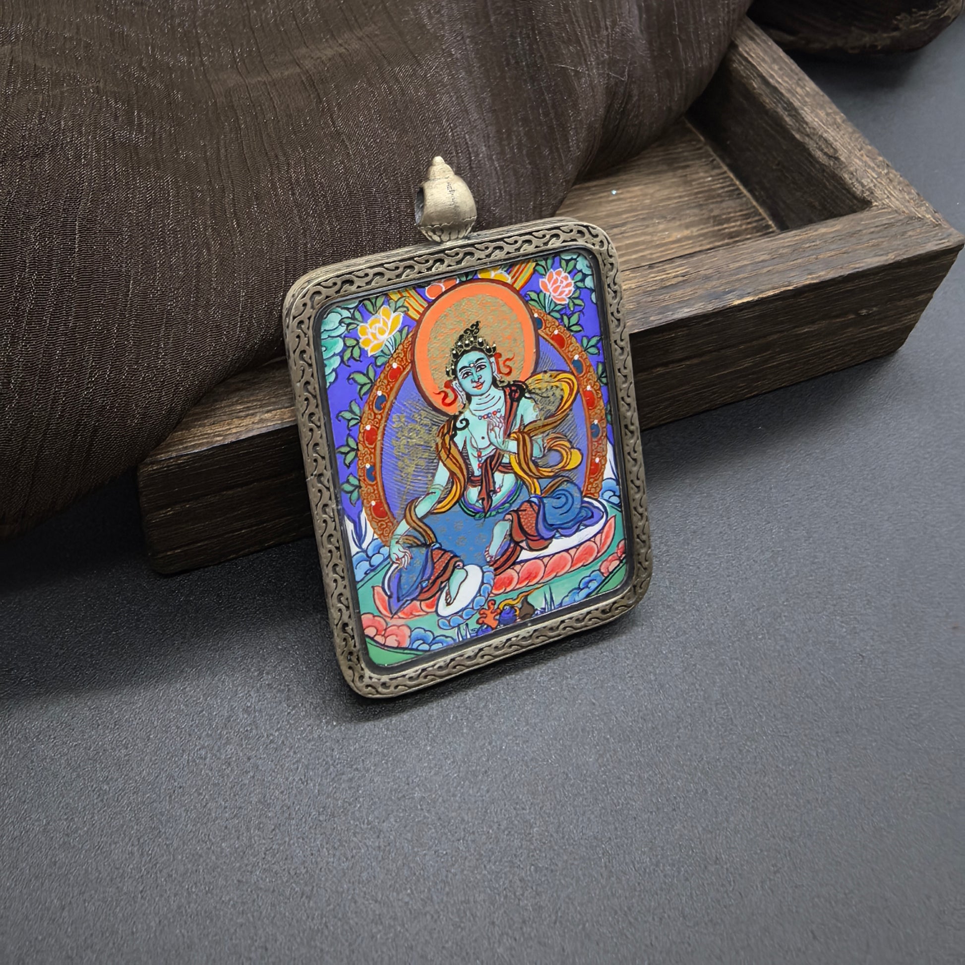  The Rekong Green Tara pendant with 925 silver displayed as a sacred amulet for compassion and liberation, embodying Buddhist tradition.

