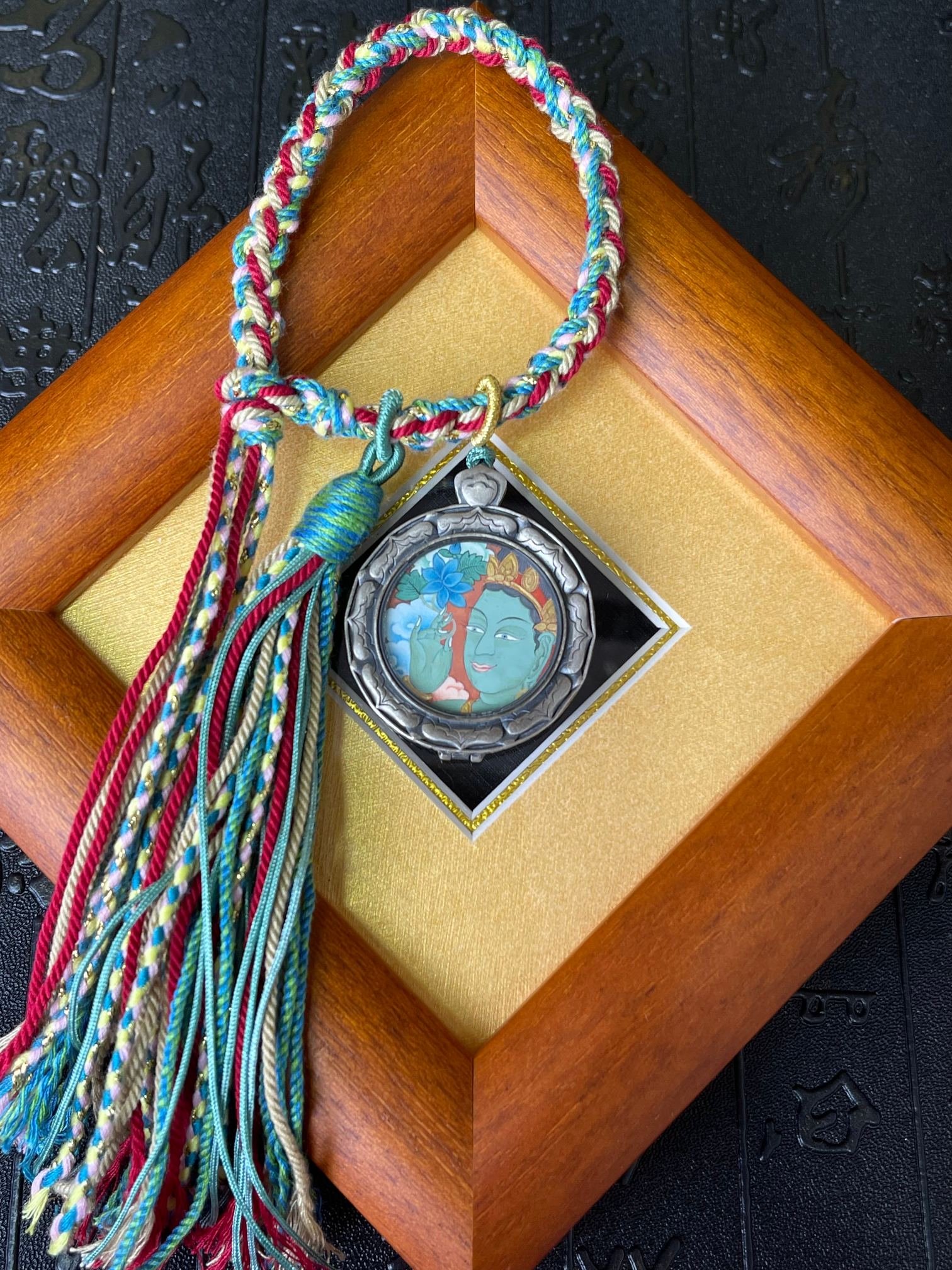  Close-up detail of the Tibet Card Green Tara Thangka showing natural mineral pigments, Tibet Card series artistry.
