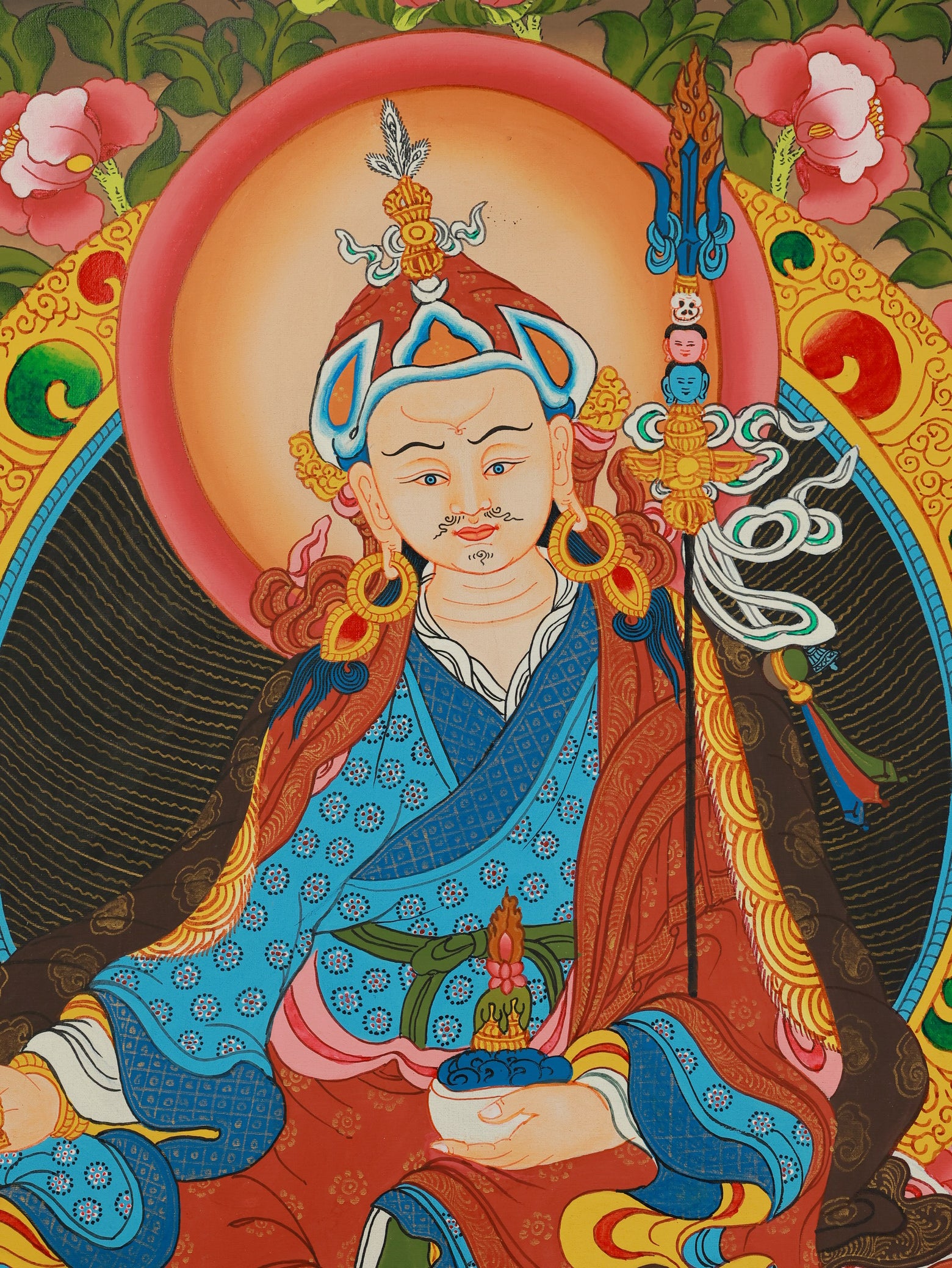 Guru Rinpoche thangka art showing Padmasambhava holding vajra and skull cup, representing tantric wisdom and spiritual power.
