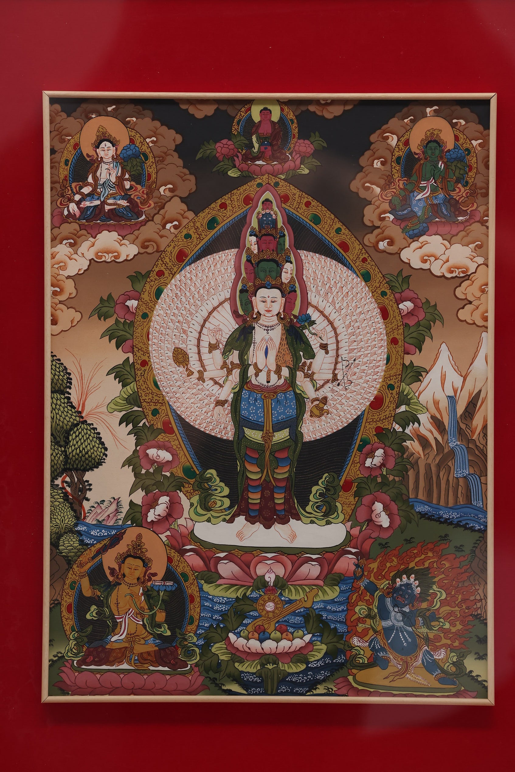 Alt Text: Tibetan Buddhist Thangka depicting Thousand-Eye Guan Yin, a sacred symbol of mercy and spiritual awakening.