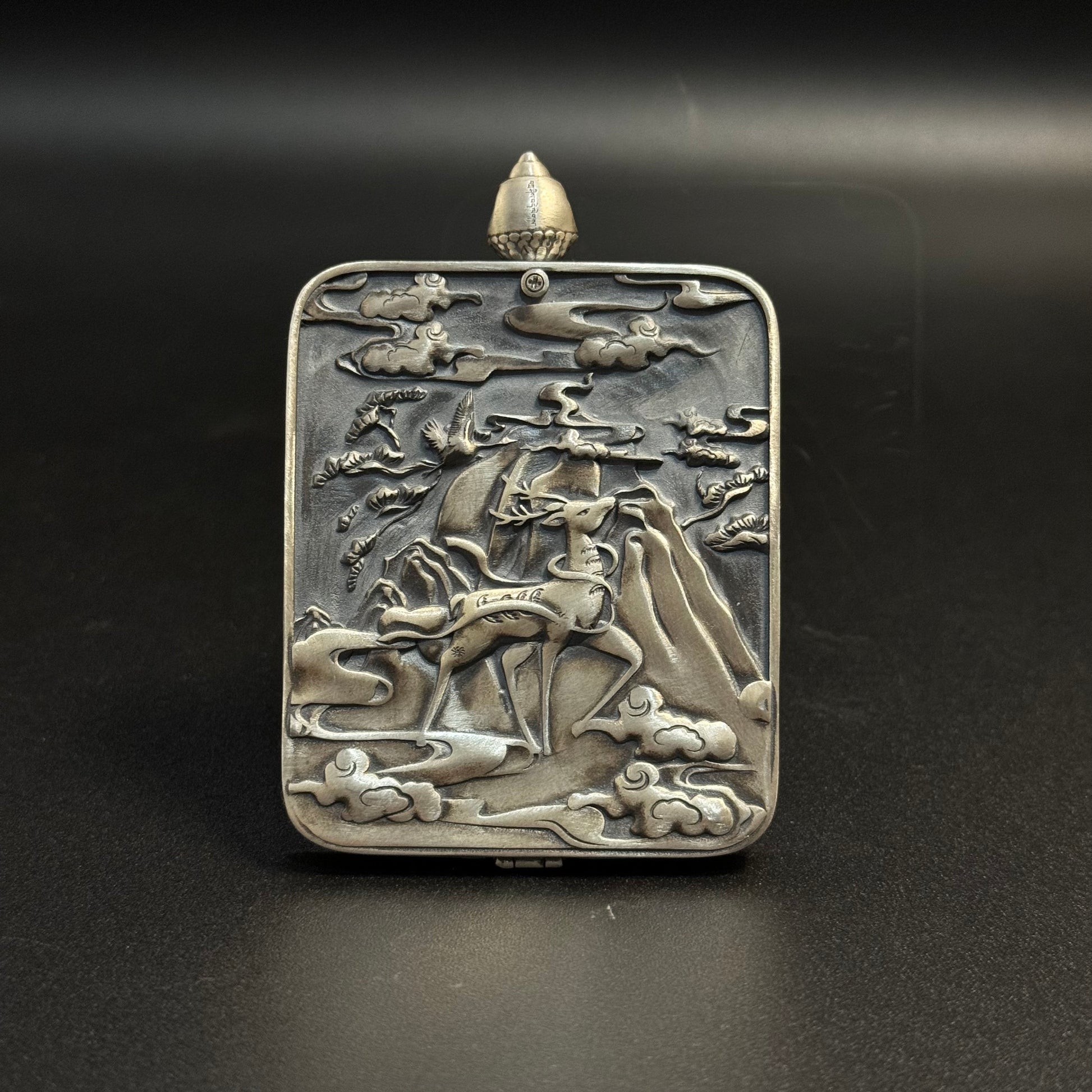  The Rekong Cuiying Hayagriva Thangka pendant displayed as a sacred amulet for compassion in wrathful form and obstacle removal.

