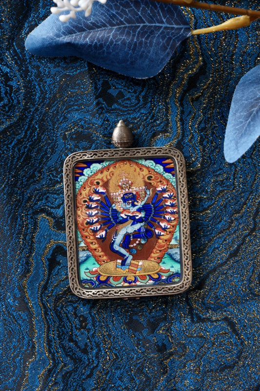 Thangka necklace portraying Hevajra, the Joyful Vajra, representing spiritual bliss, wisdom, and tantric practice.