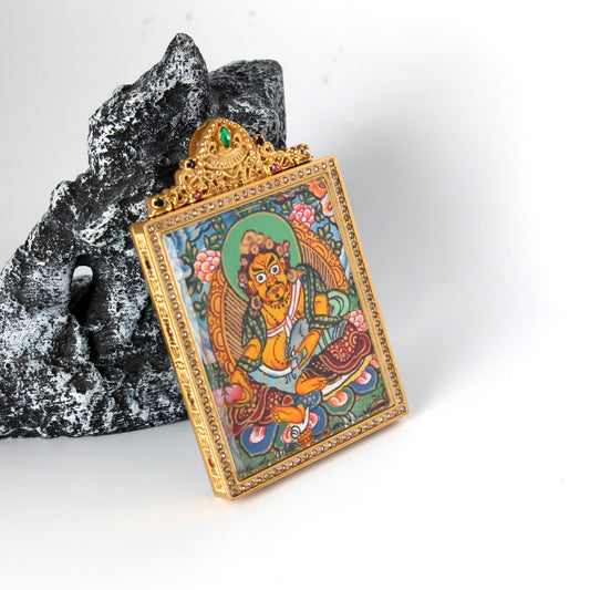 Hand-painted Nepal Premium Yellow Jambhala Thangka pendant featuring the King of Wealth, encased in titanium steel, representing prosperity in Tibetan Buddhist tradition.
