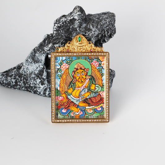  Close-up detail of the Nepal Premium Yellow Jambhala Thangka painting showing intricate natural mineral pigment work, showcasing the masterful artistry of Nepali lineage painters.
