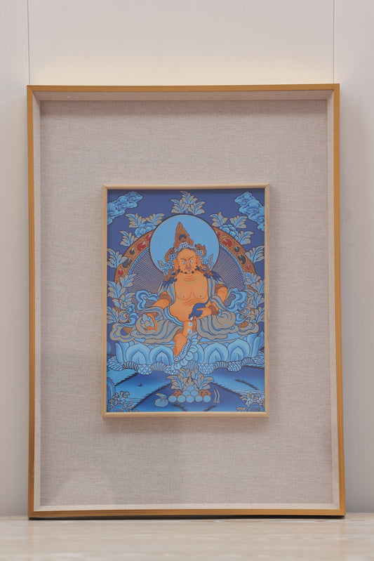 Traditional Tibetan Buddhist art of Yellow Jambhala, finely detailed thangka expressing wealth, merit, and compassionate giving