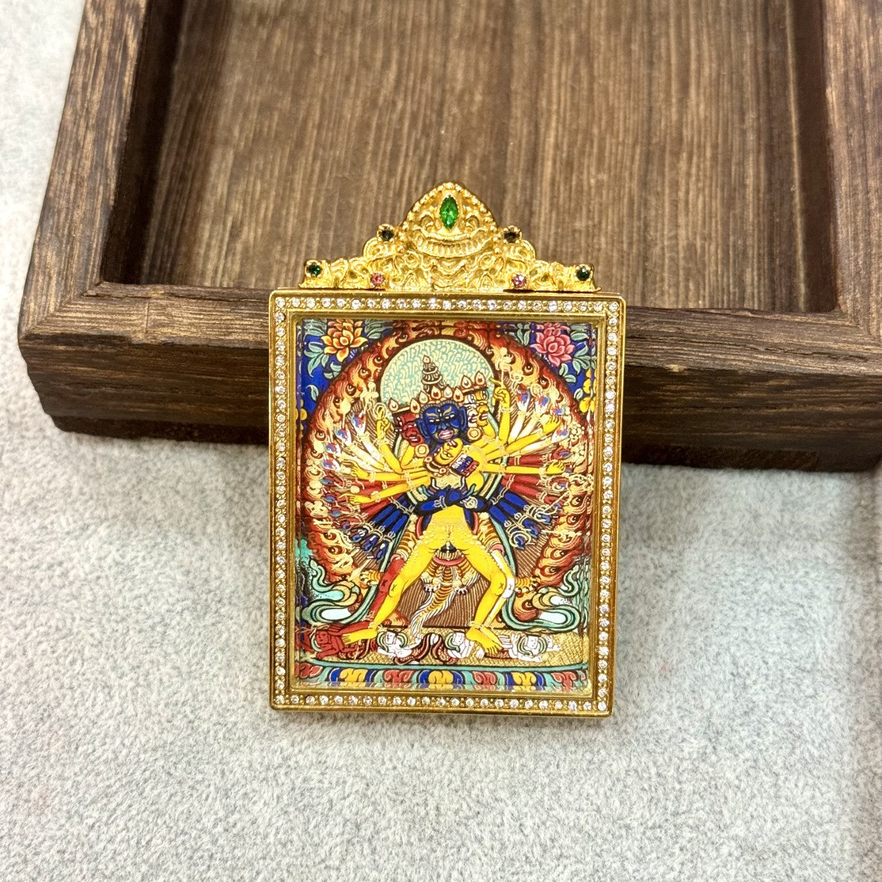  Close-up detail of the Rebgong Kalachakra Thangka painting showing intricate natural mineral pigment work, showcasing the masterful artistry of Rebgong lama artists.
