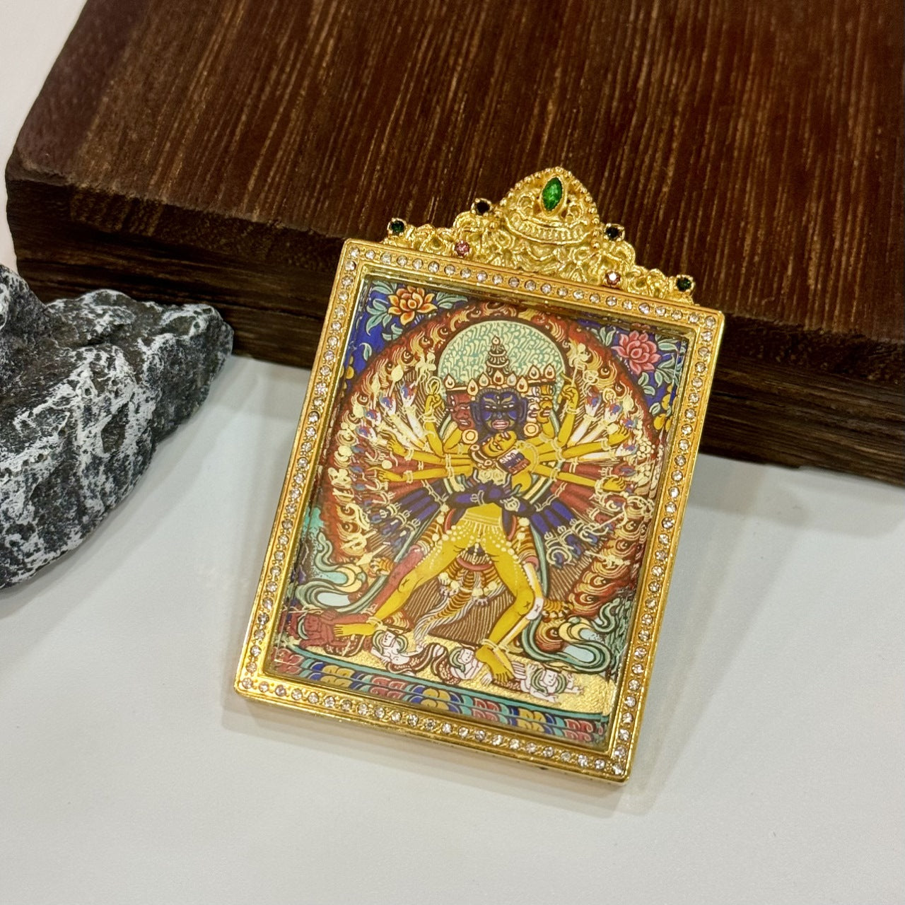 The Rebgong Kalachakra Thangka pendant displayed as a sacred amulet for wisdom and liberation, embodying Tibetan Buddhist tradition.
