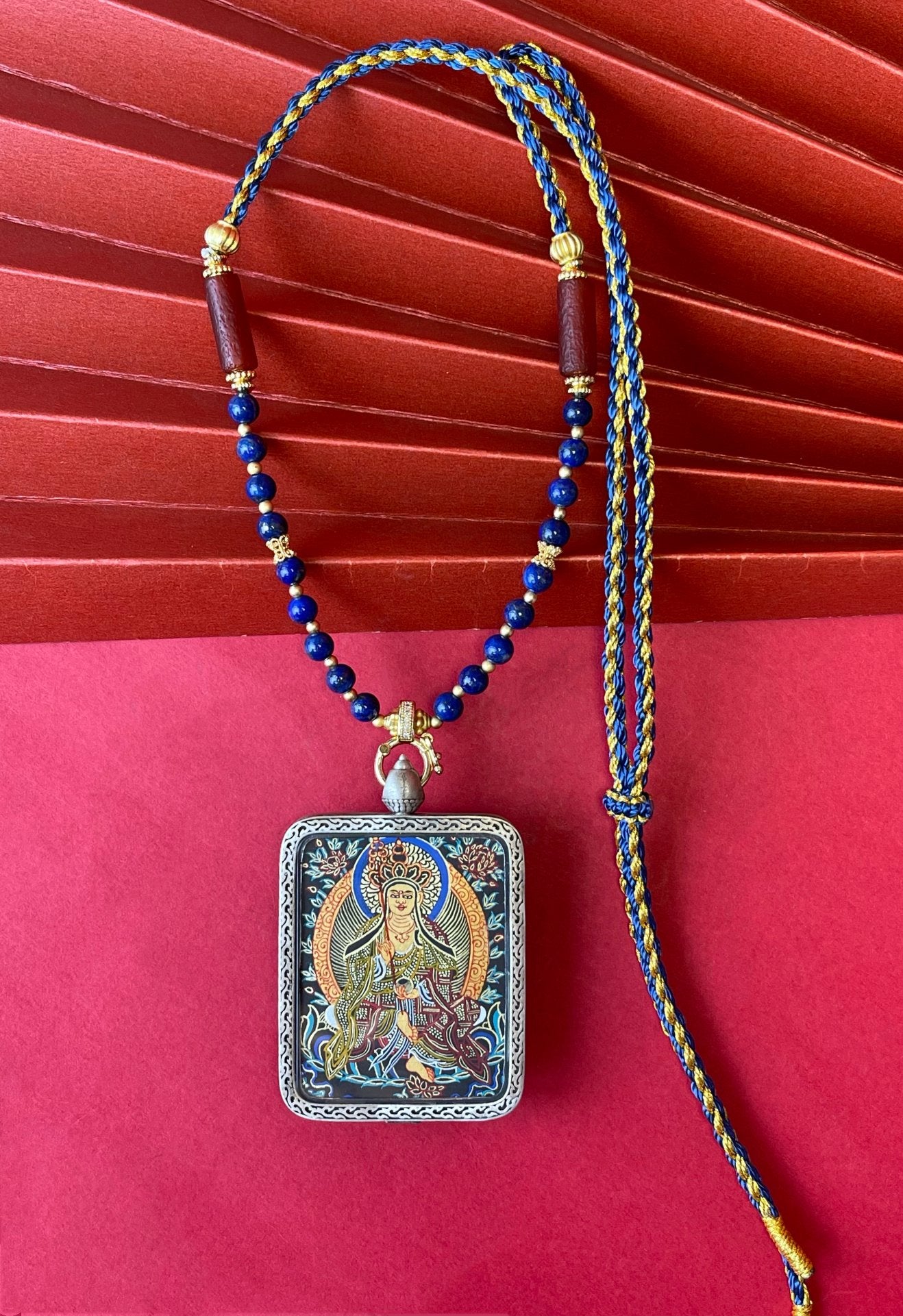  Hand-painted Rekong Ksitigarbha (地藏王菩萨) Black Gold Thangka pendant 3.5x4.5cm with Nine-Colour Deer relief silver casing featuring the Great Vow Bodhisattva, representing liberate beings and fulfil wishes in Buddhist tradition.

