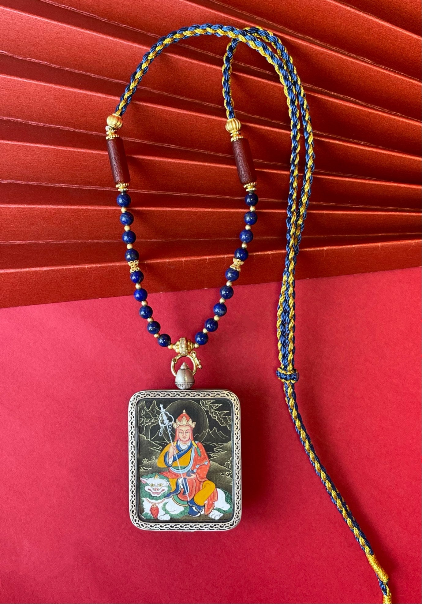Detailed view of the 925 silver casing and lapis cord for the Ksitigarbha Thangka pendant, symbolising the great vow and tradition in Buddhist practice.
