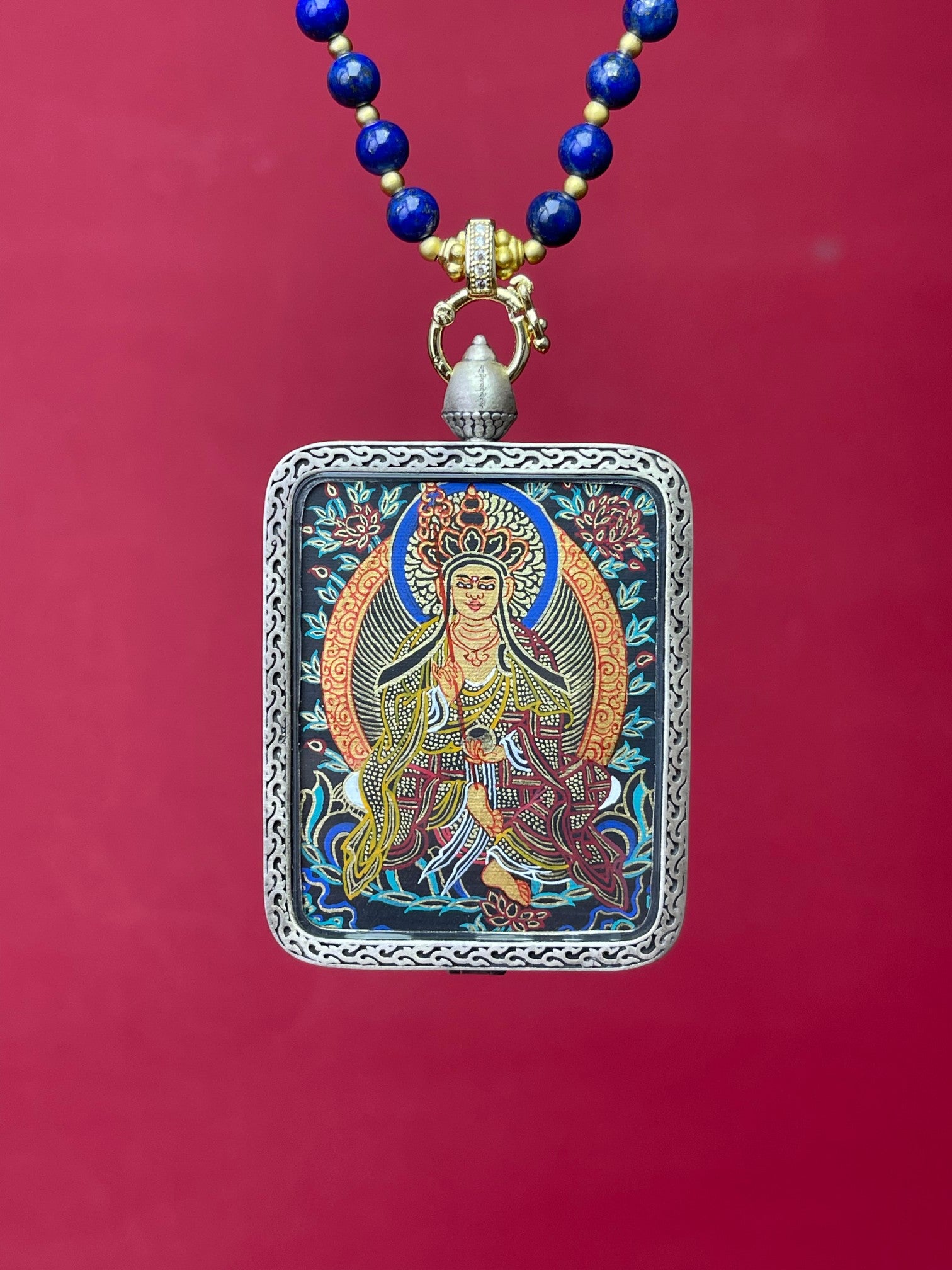  Detailed view of the Nine-Colour Deer relief silver casing for the Ksitigarbha Thangka pendant, symbolising the great vow and tradition in Buddhist practice.