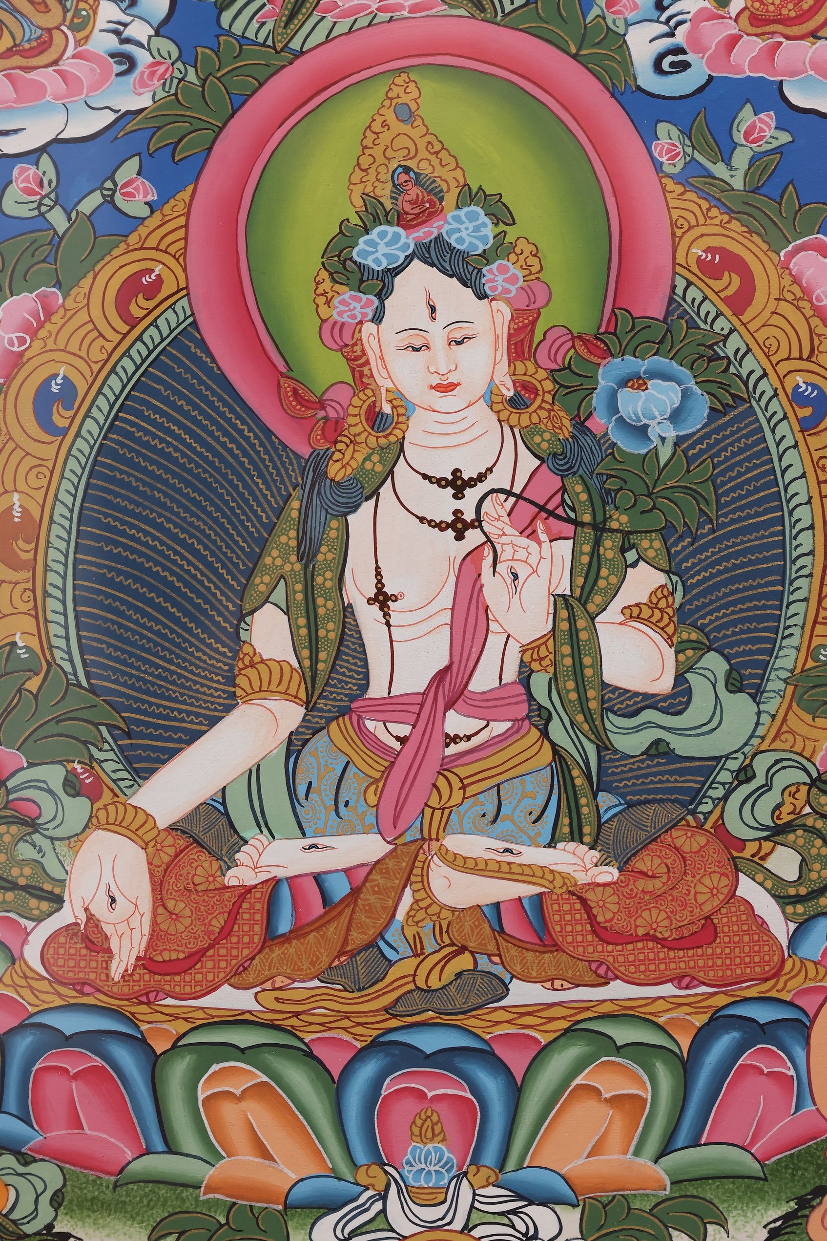 Tibetan Buddhist longevity thangka featuring Amitayus, White Tara, and Ushnishavijaya in sacred harmony