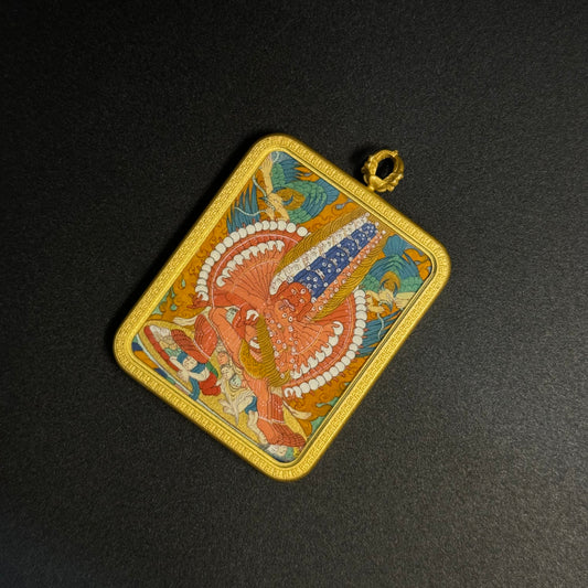  A 3.5x4.5cm hand-painted Rekong Cuiying series Maha Heruka (马哈黑路噶) Thangka pendant featuring wrathful compassion and liberation in Buddhist tradition.

