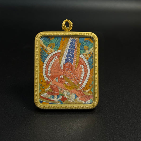  Detailed view of the presentation and casing for the Maha Heruka Cuiying Thangka pendant.
