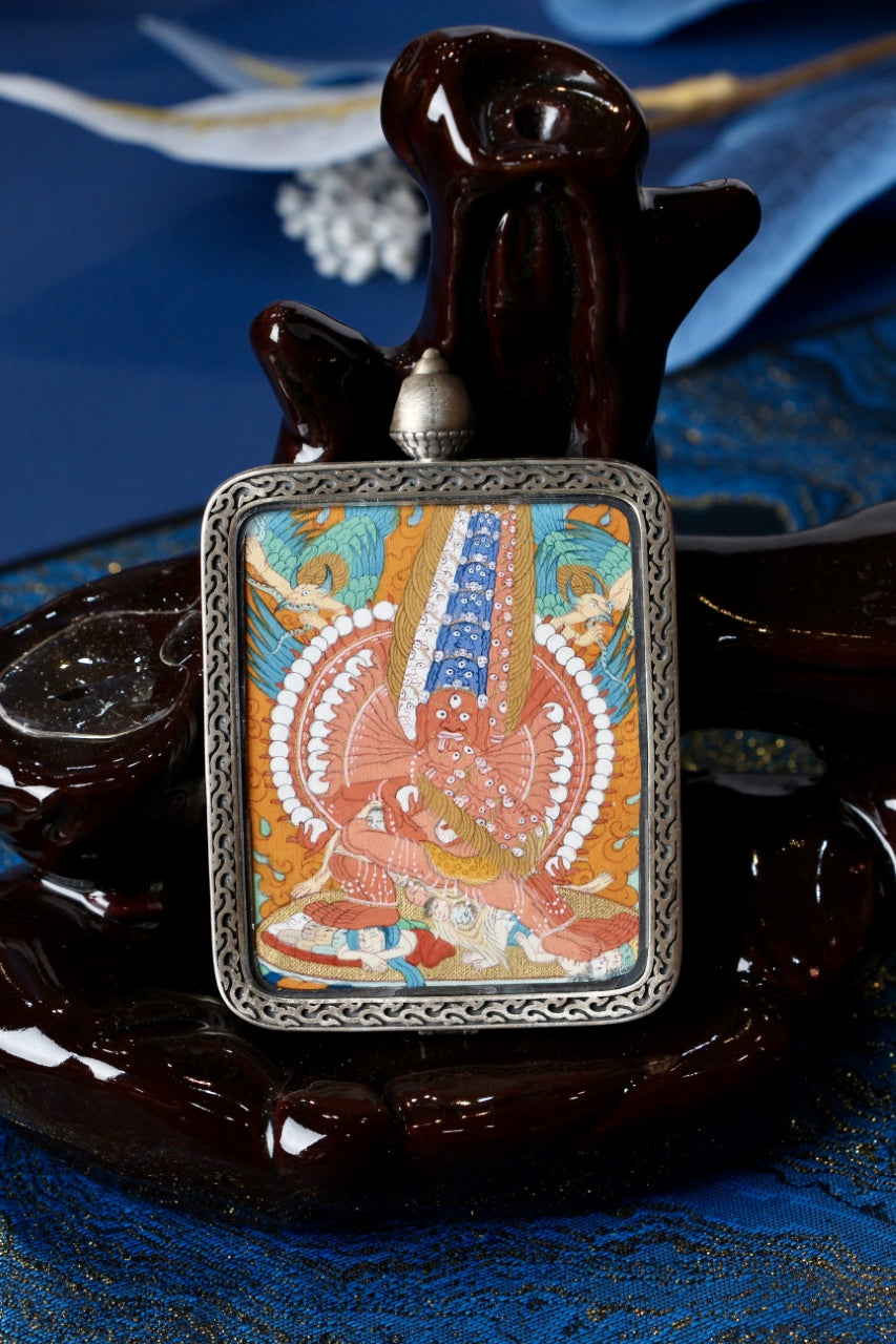 Maha Heruka thangka pendant depicting the Tibetan Buddhist wrathful deity, symbolizing spiritual power, protection, and tantric transformation.