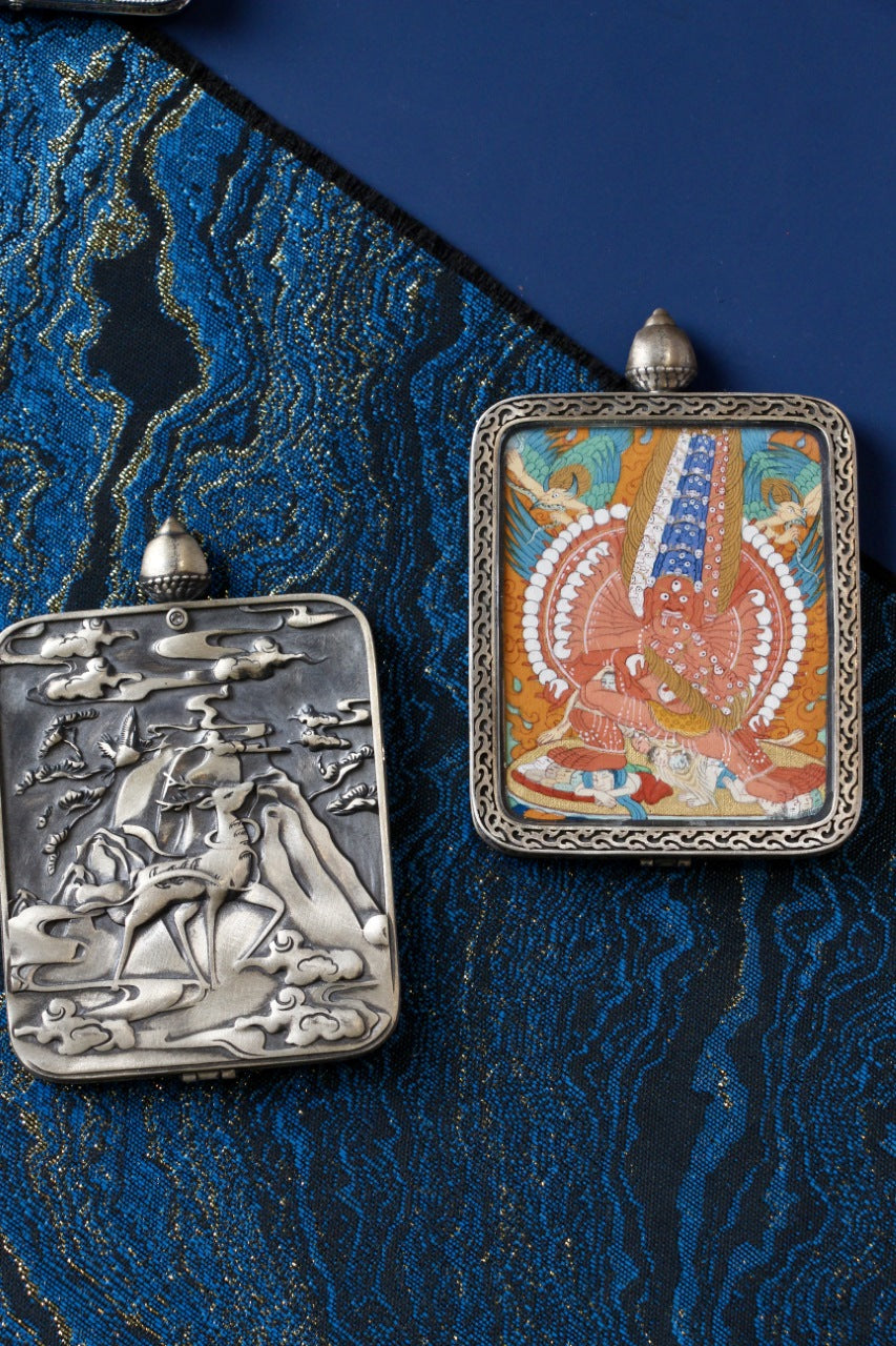 Tibetan thangka jewelry featuring Maha Heruka, inspired by traditional Tibetan Buddhist sacred art and wrathful deity iconography.