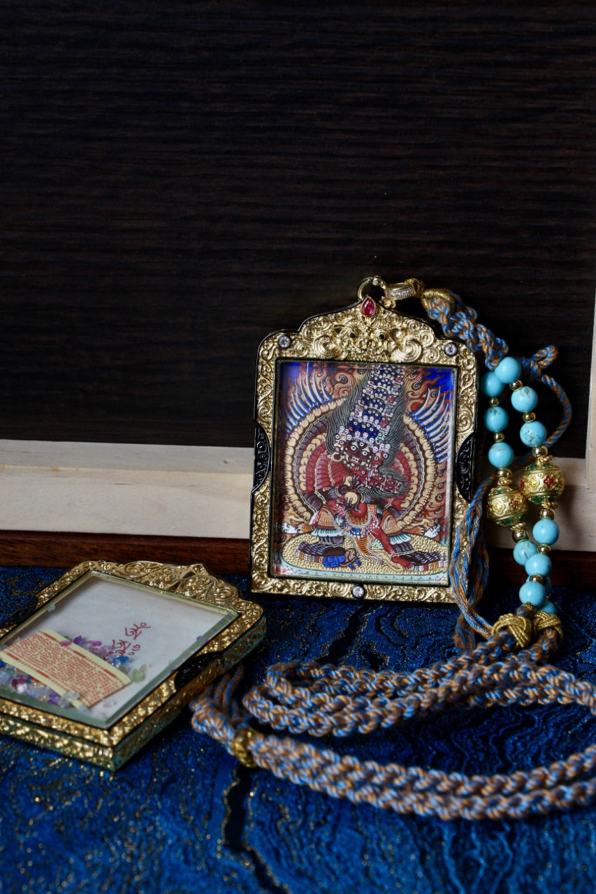 Mahaheruka tantric thangka jewelry representing fierce compassion and wisdom in Tibetan Buddhist culture.