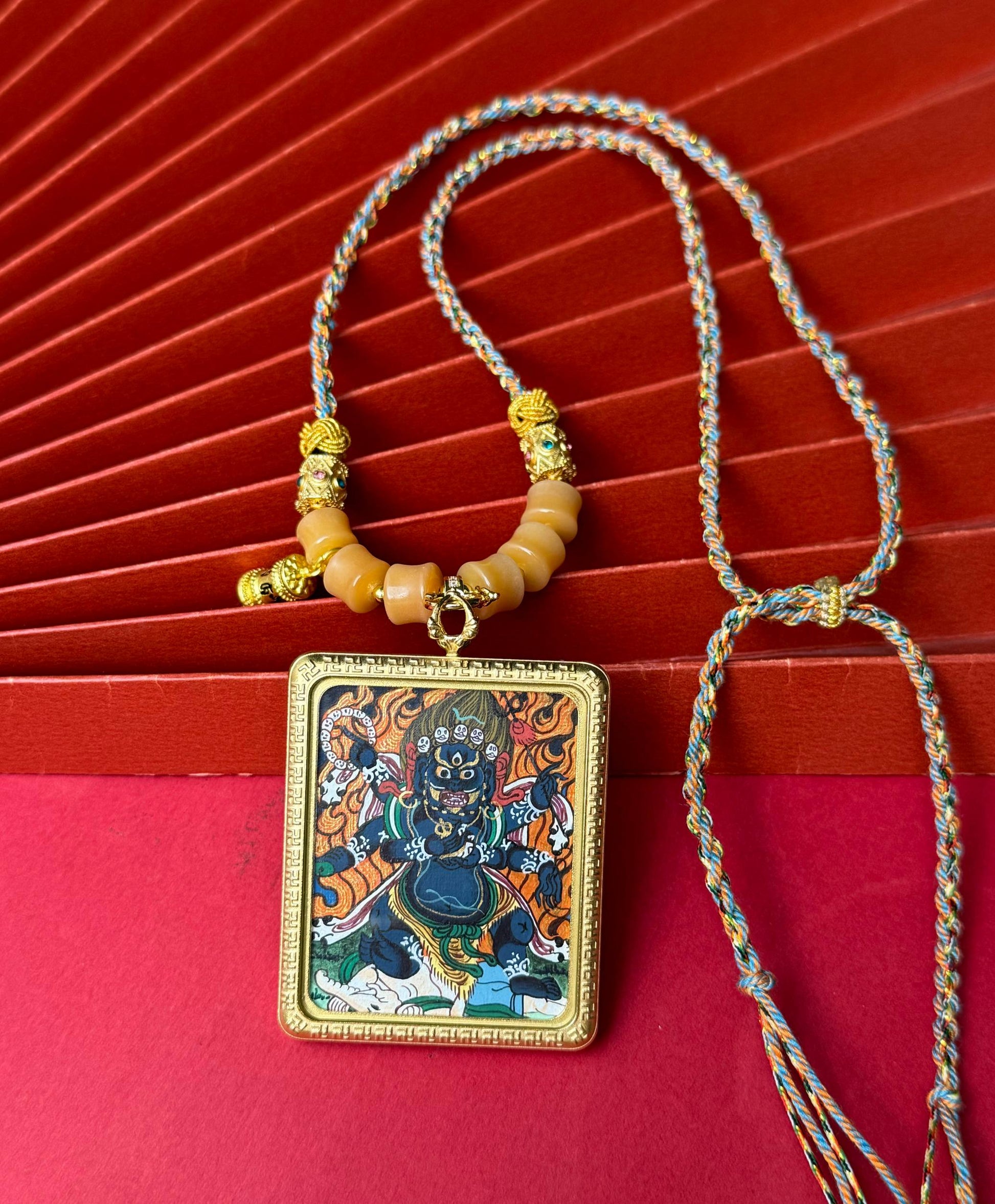  Close-up detail of the Nepal Six-Armed Mahakala Thangka showing hand-painted mineral pigments, showcasing the masterful artistry and vivid expression.
