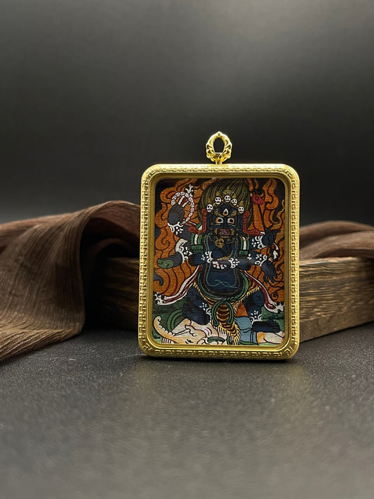  Detailed view of the titanium casing for the Mahakala Thangka pendant, symbolising protection and tradition in Buddhist practice