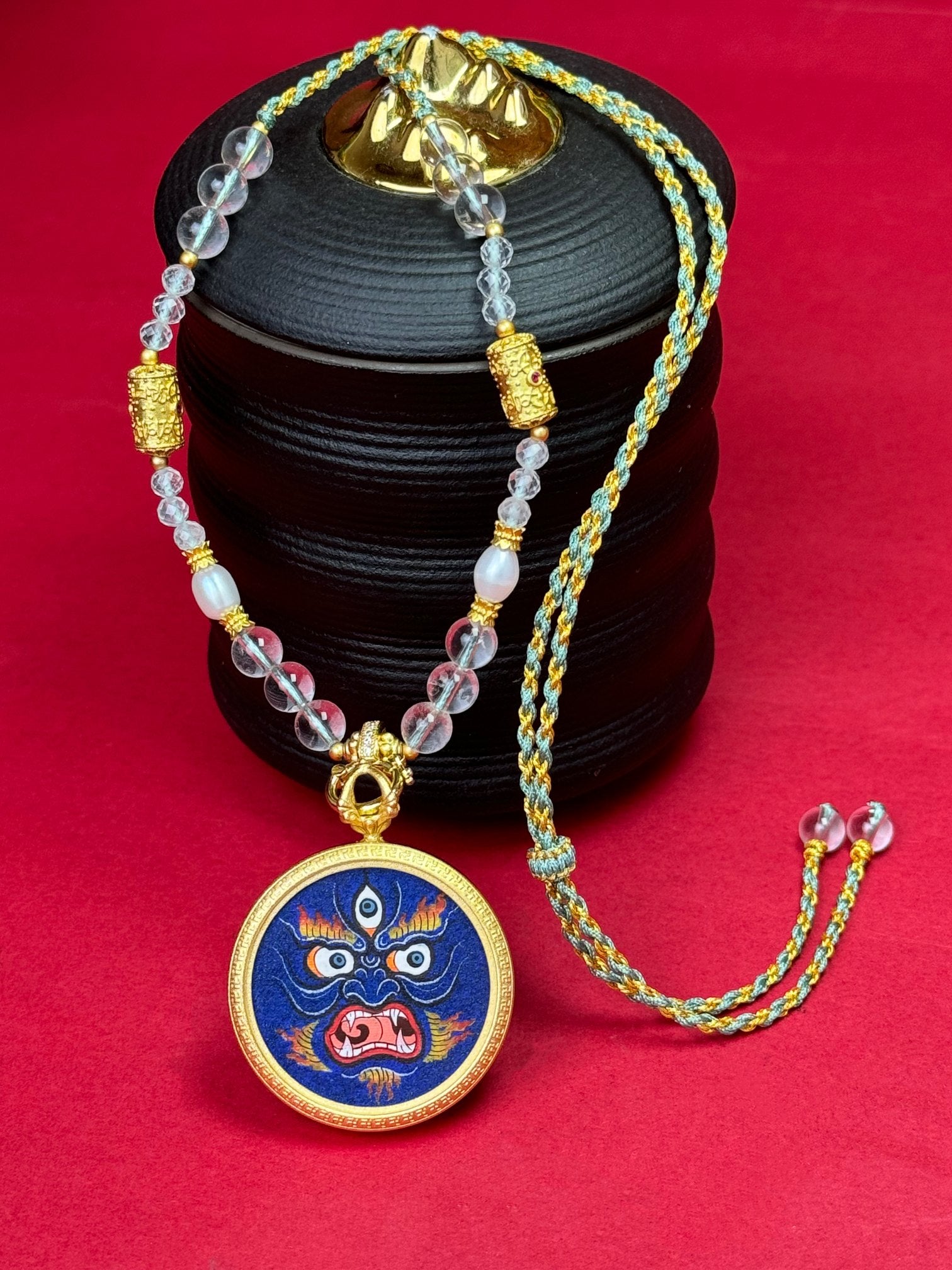 Hand-painted Tibet Coarse Mahakala Buddha Face (大黑天佛脸) Thangka pendant 3cm with matte copper casing featuring the war deity and fortune deity, representing abundant life and prosperous wealth in Buddhist tradition.


