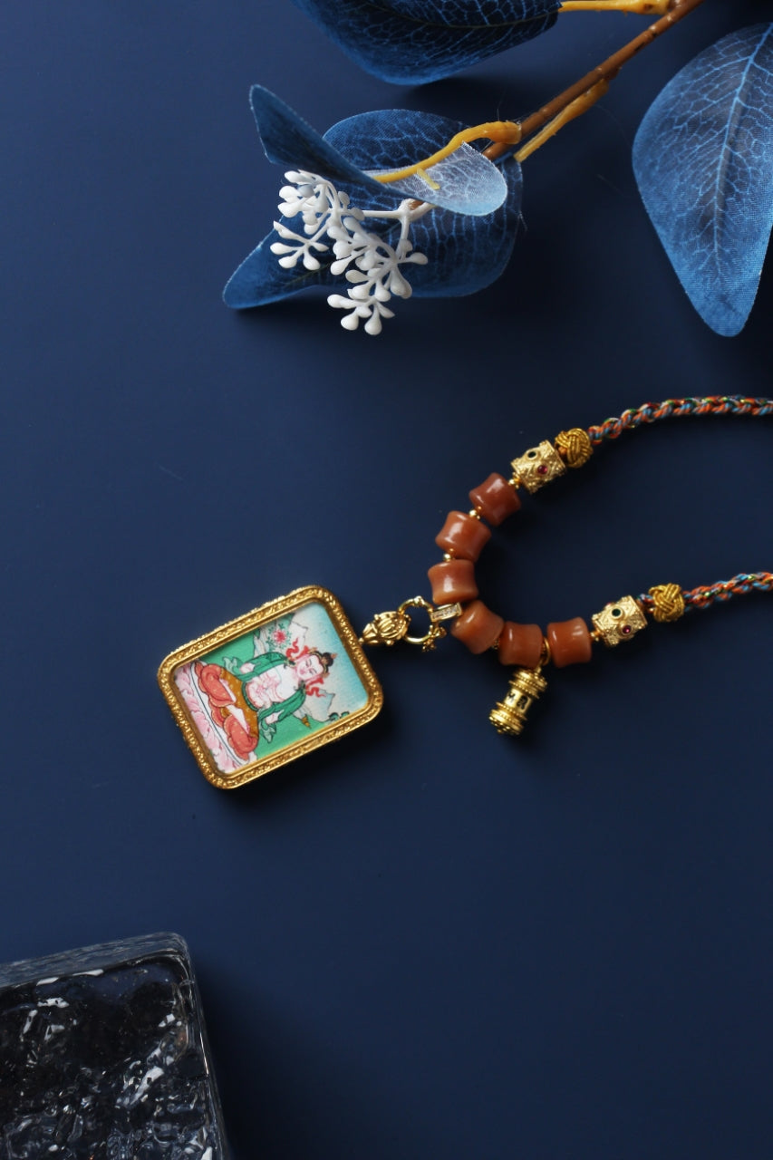  Close-up detail of the Karma Kagyu Mahasthamaprapta Thangka painting showing intricate natural mineral pigment work and serene expression, showcasing the masterful artistry of Tibetan lineage painters.

