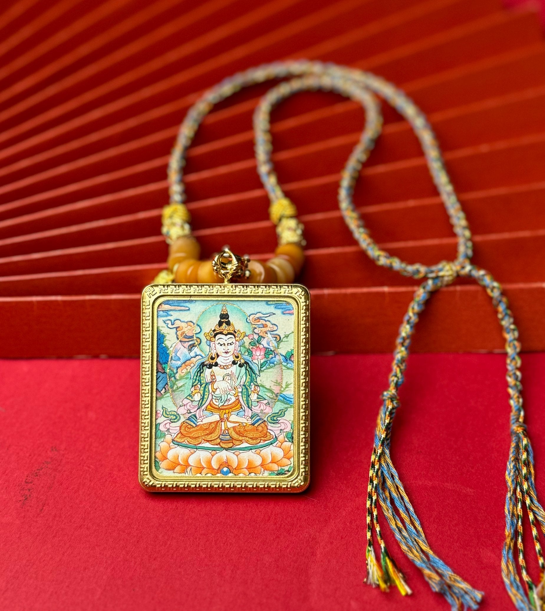  Close-up detail of the Nepal Mahasthamaprapta Thangka showing hand-painted mineral pigments, showcasing the masterful artistry.

